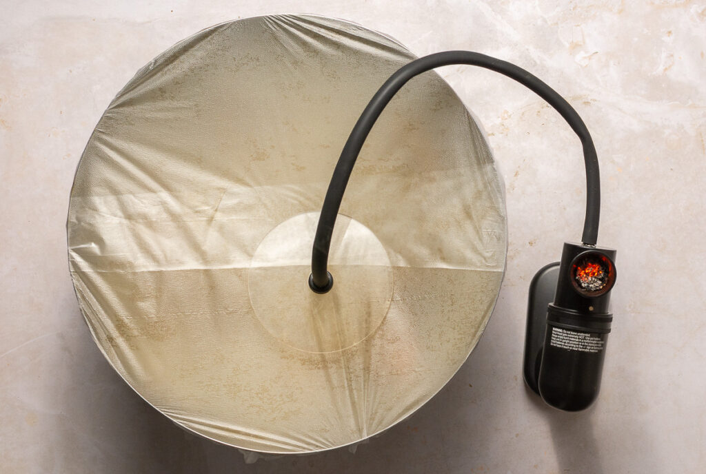 smoking curry-marinated goat for Jamaican curry goat