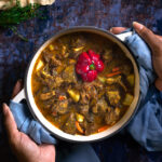 Jamaican curry goat in a dutch oven