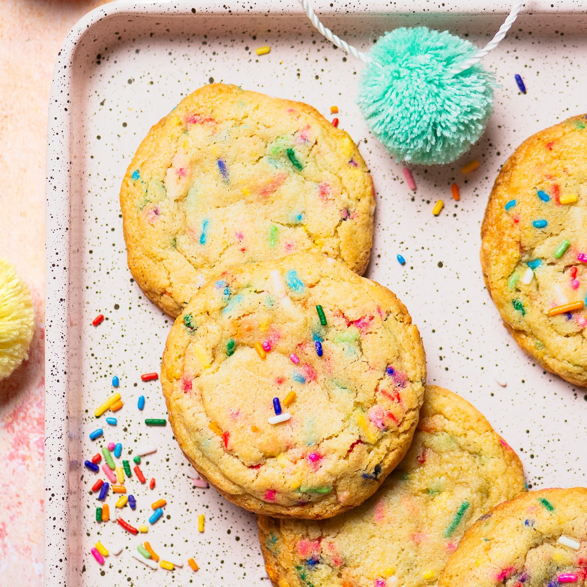 confetti cookies on a baking sheet.