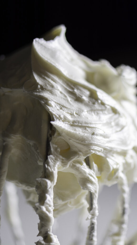 swiss meringue buttercream on a whisk