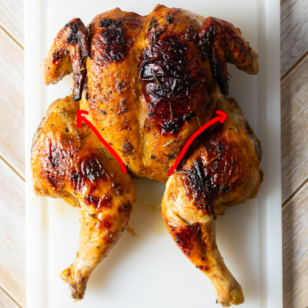 how to break apart a spatchcocked and whole roasted orange maple chicken