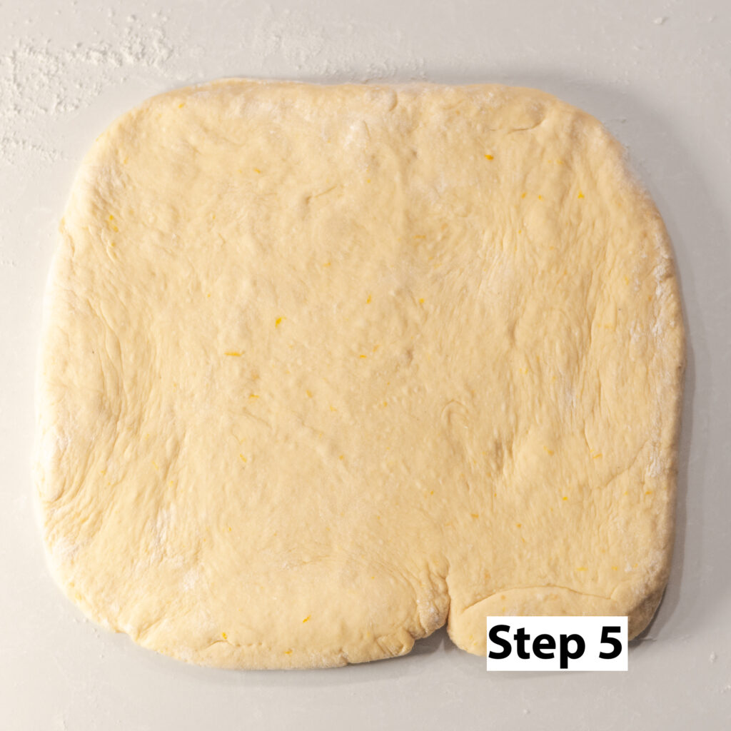 rolling out dough for New Orleans-style beignets