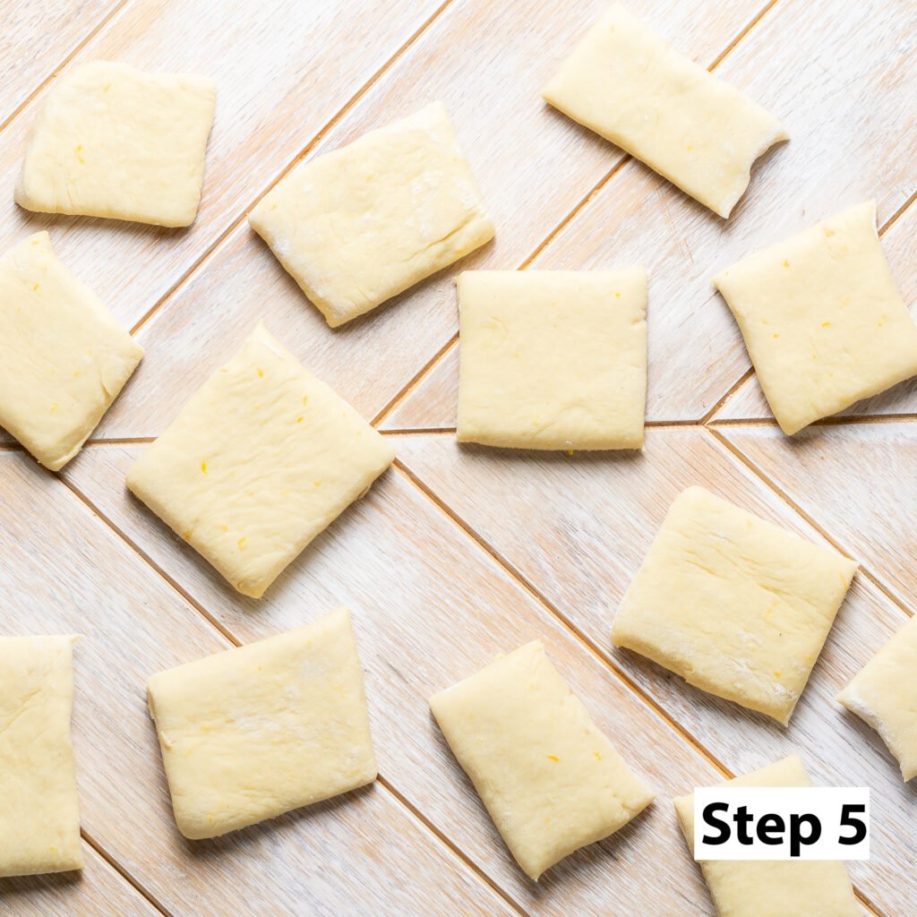 cutting dough for New Orleans-style beignets