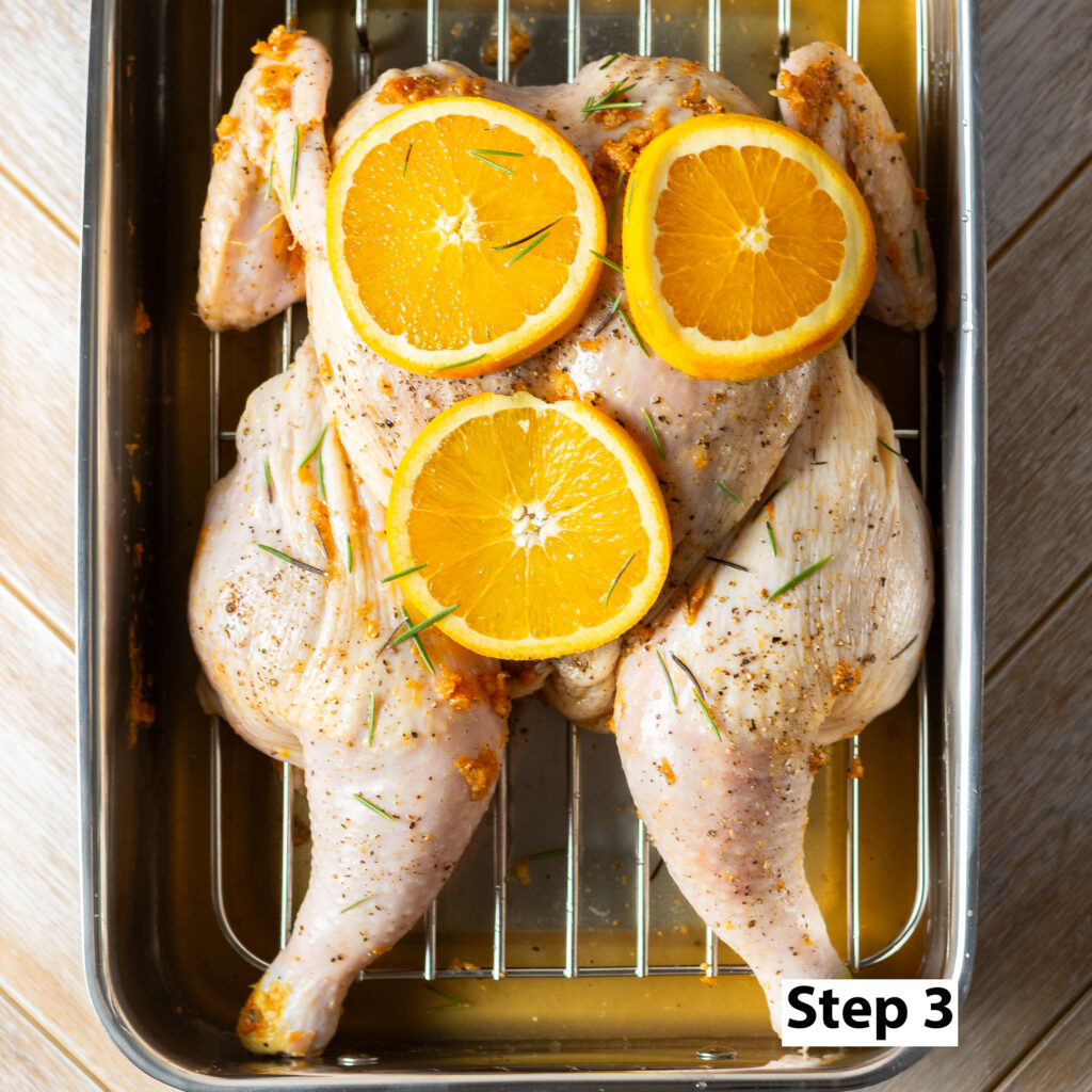 orange-maple seasoned spatchcocked chicken to be whole roasted