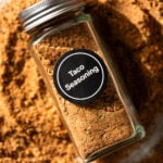 filled spice jar with "taco seasoning" label