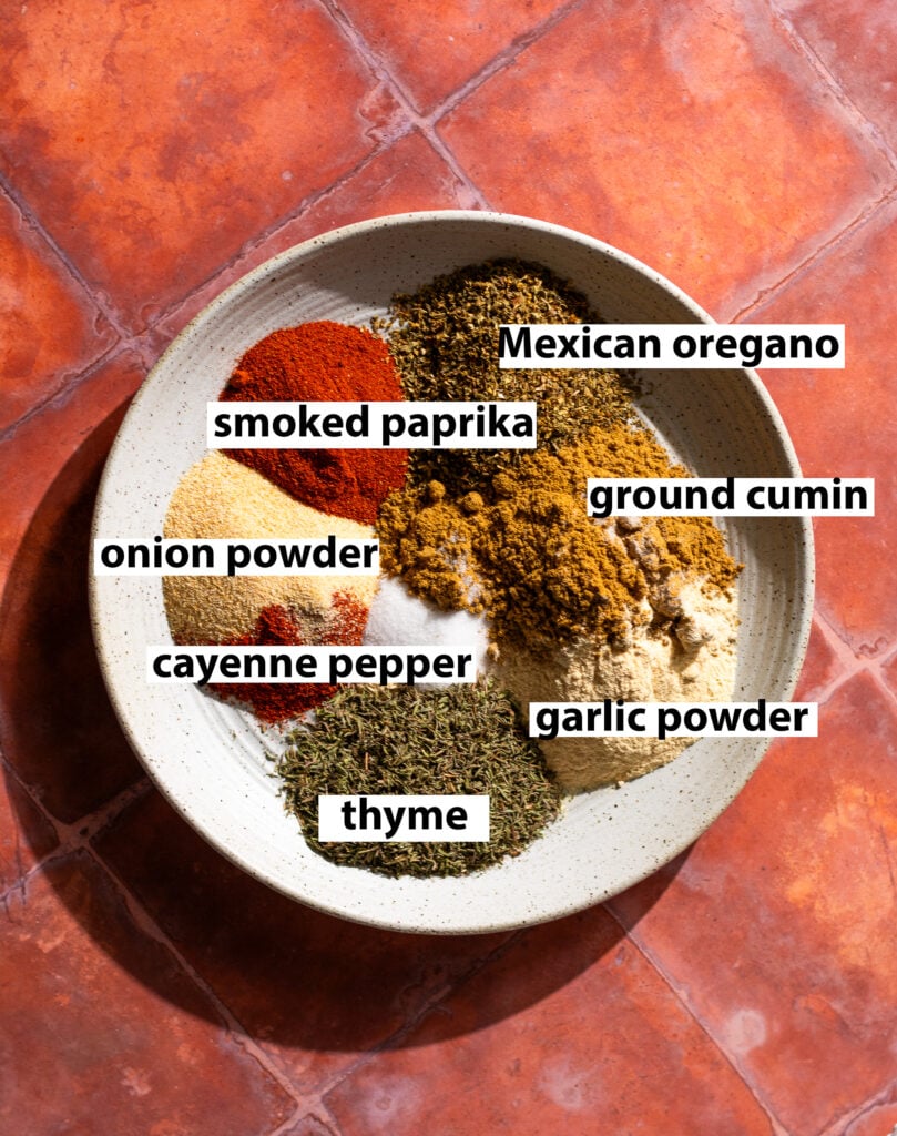ingredients for the best homemade taco seasoning - Mexican oregano, ground cumin, garlic powder, cayenne pepper, onion powder, smoked paprika