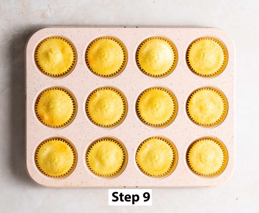 baked lemon cupcakes still in cupcake tray