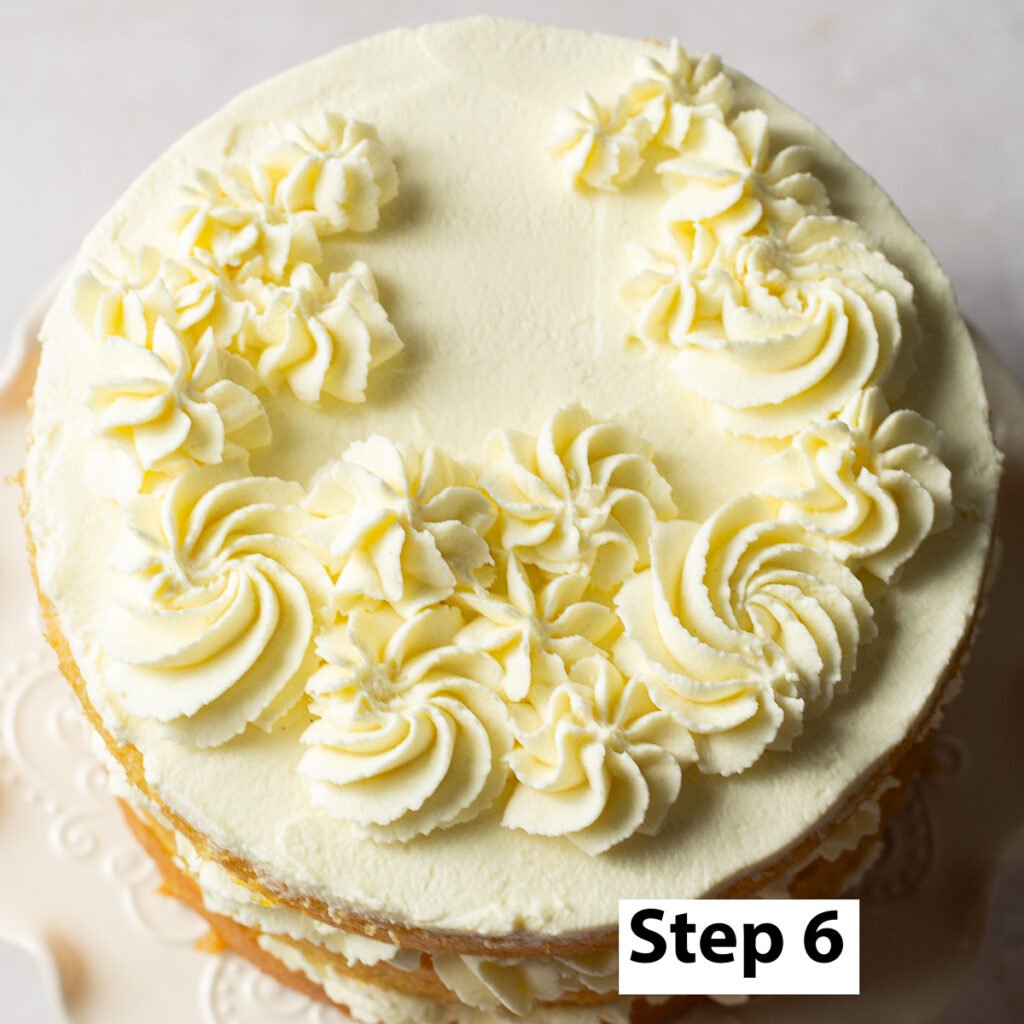 naked cake with piped rosettes