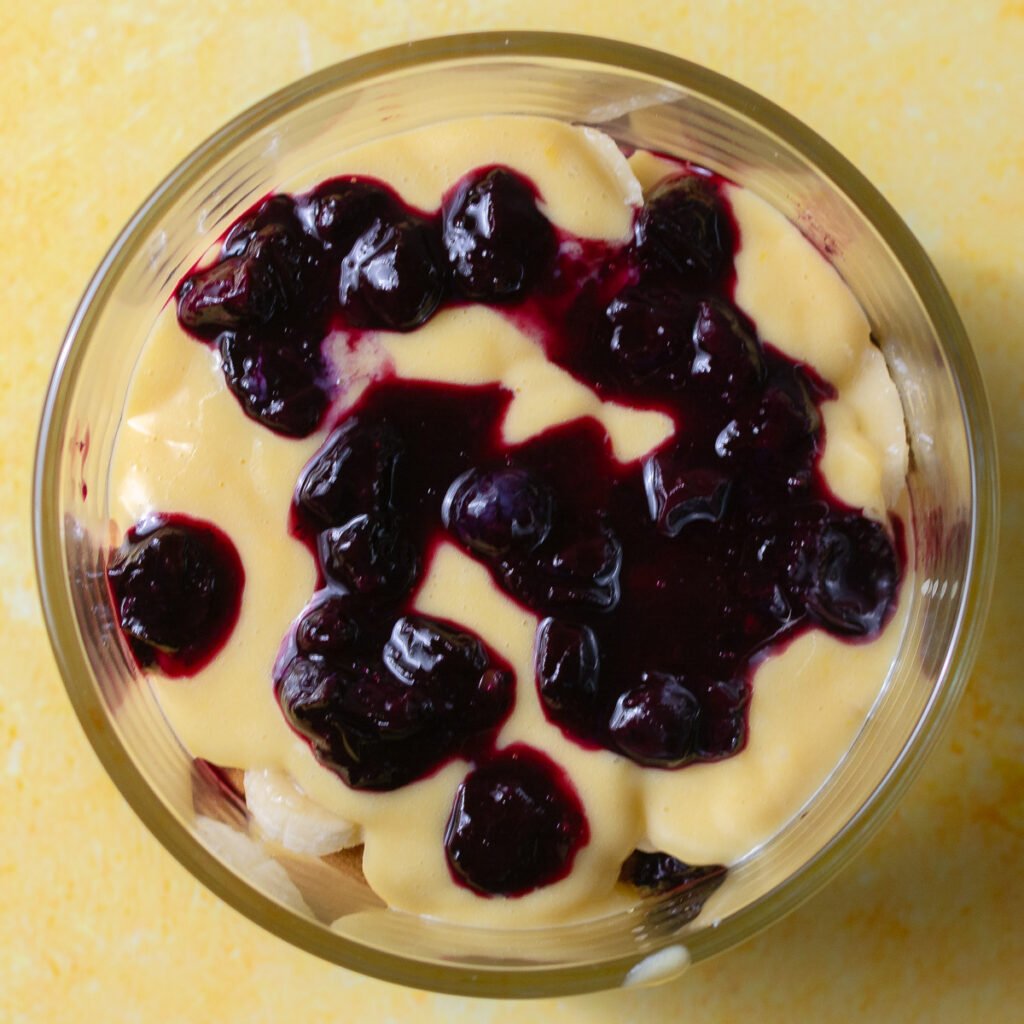 layering lemon blueberry banana pudding