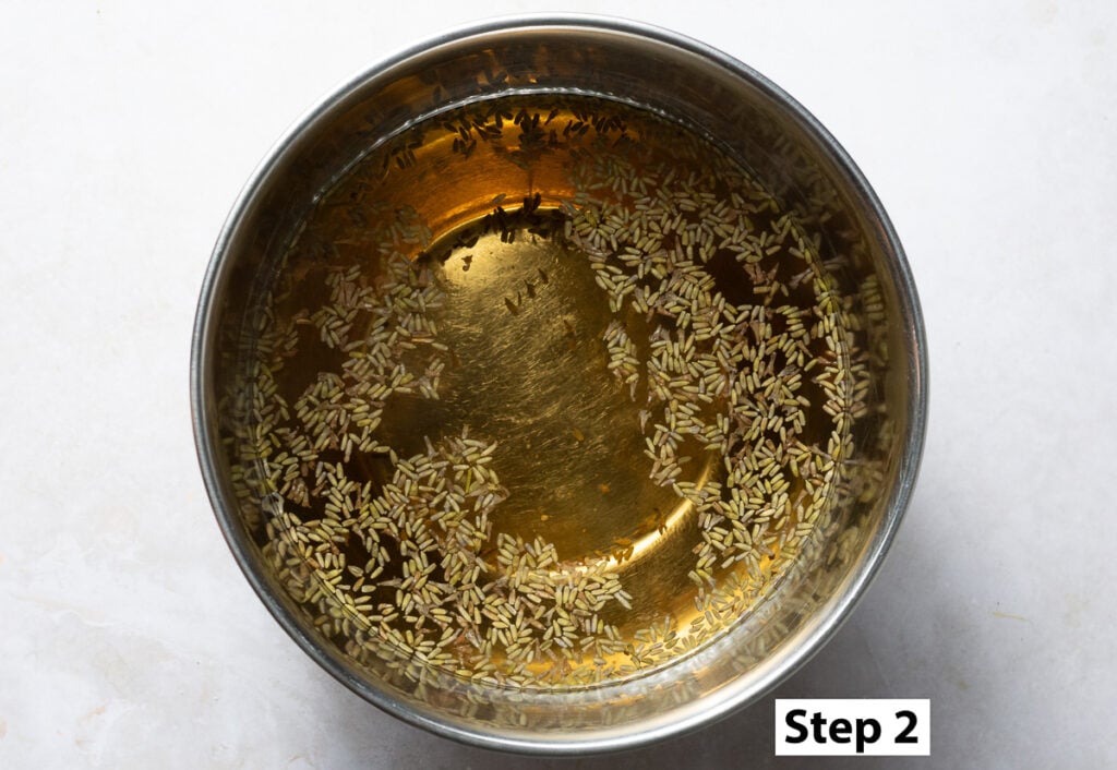 lavender flower buds steeping in hot water to make blueberry lavender lemonade