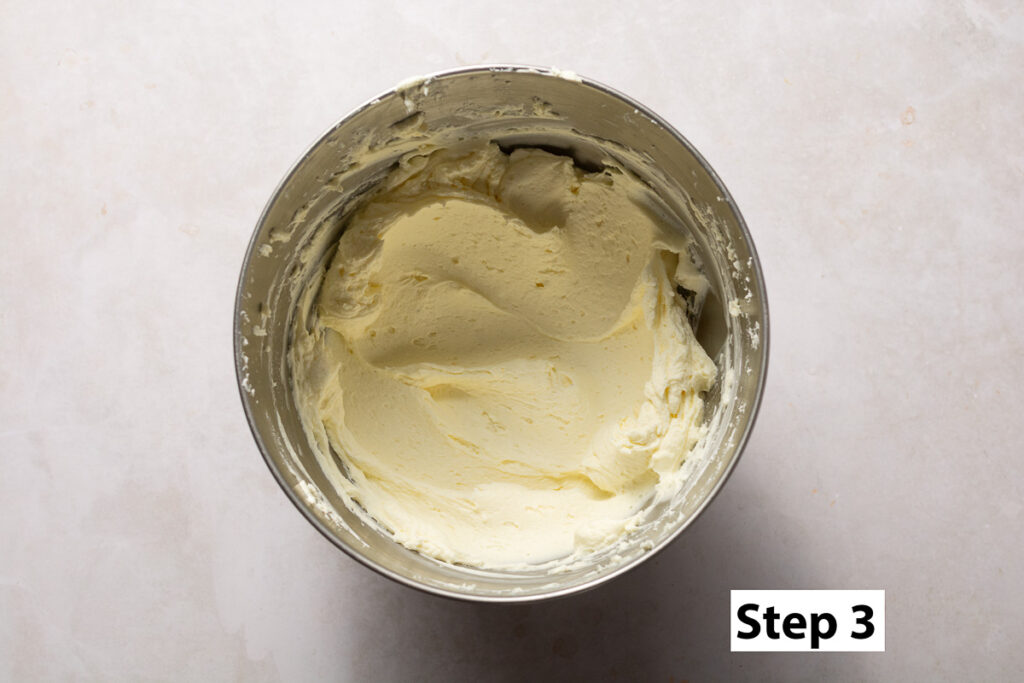 cream cheese frosting in a bowl