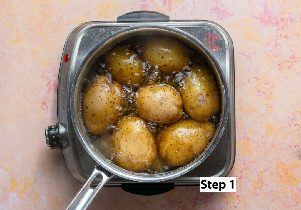 Yukon gold potatoes boiling in a pot
