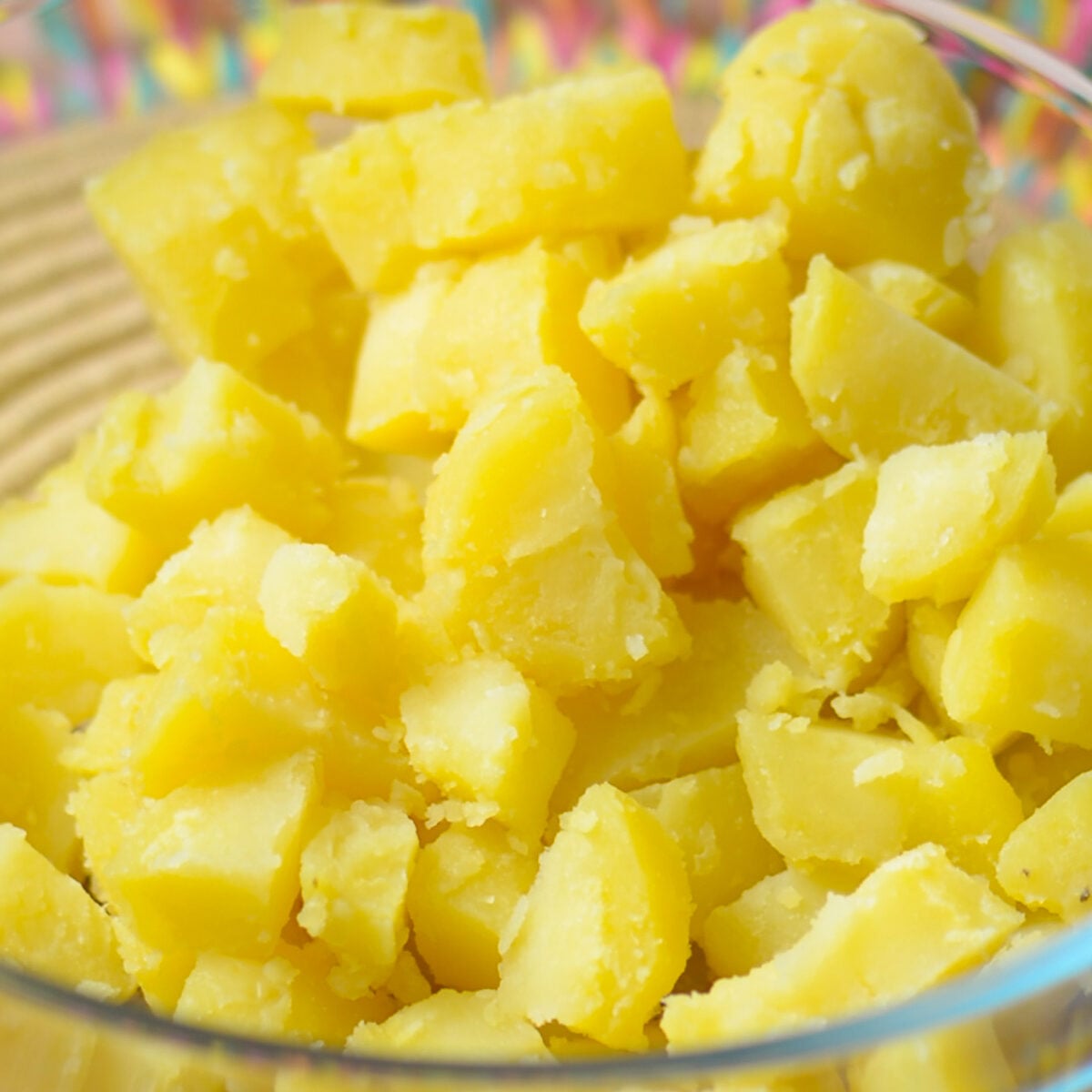 cooked and cubed potatoes in a bowl.