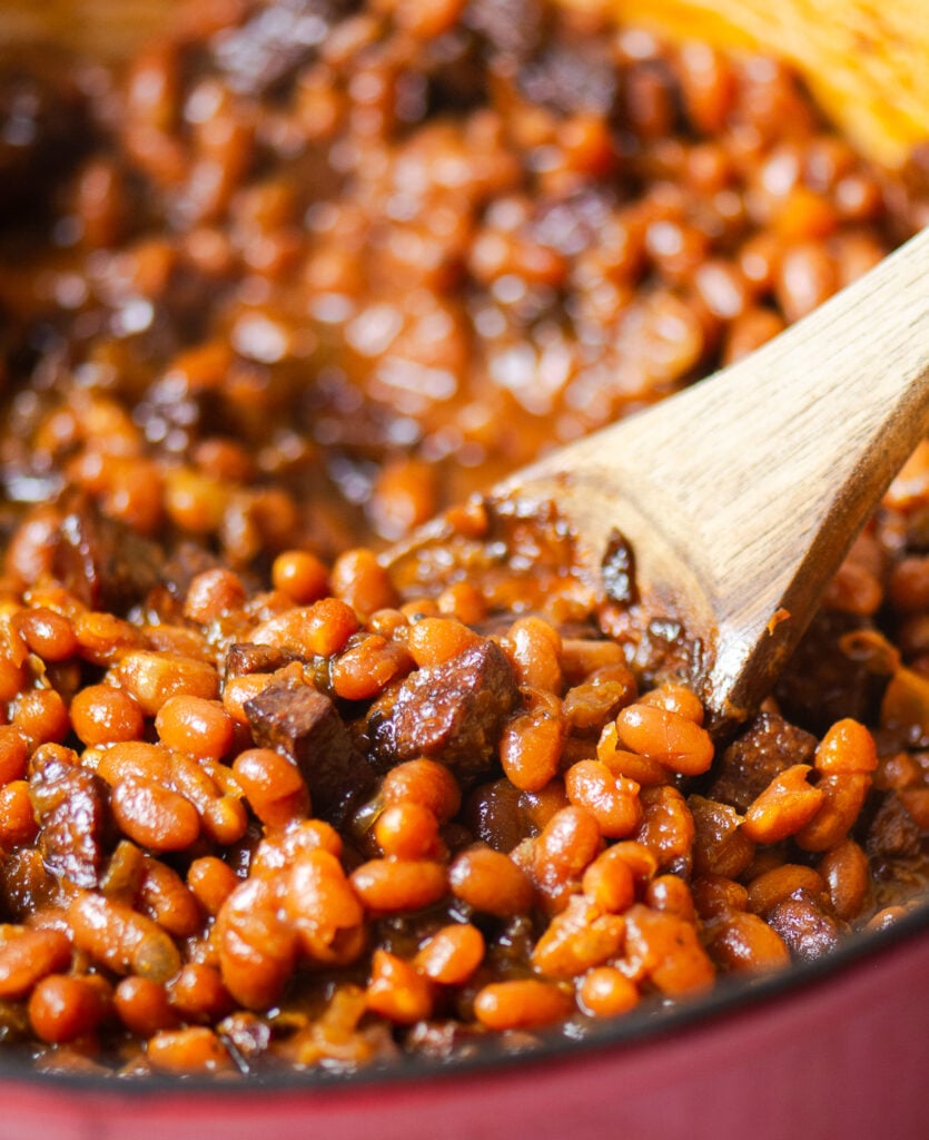 maple barbecue baked beans in a dutch oven