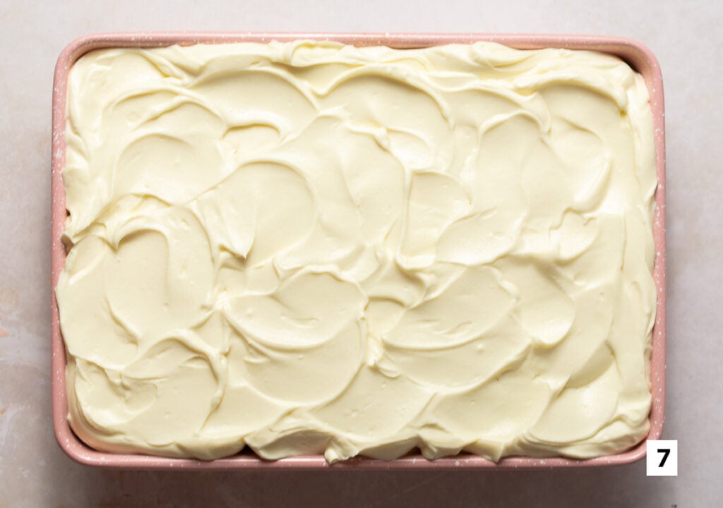 red velvet tres leches cheesecake in a pan