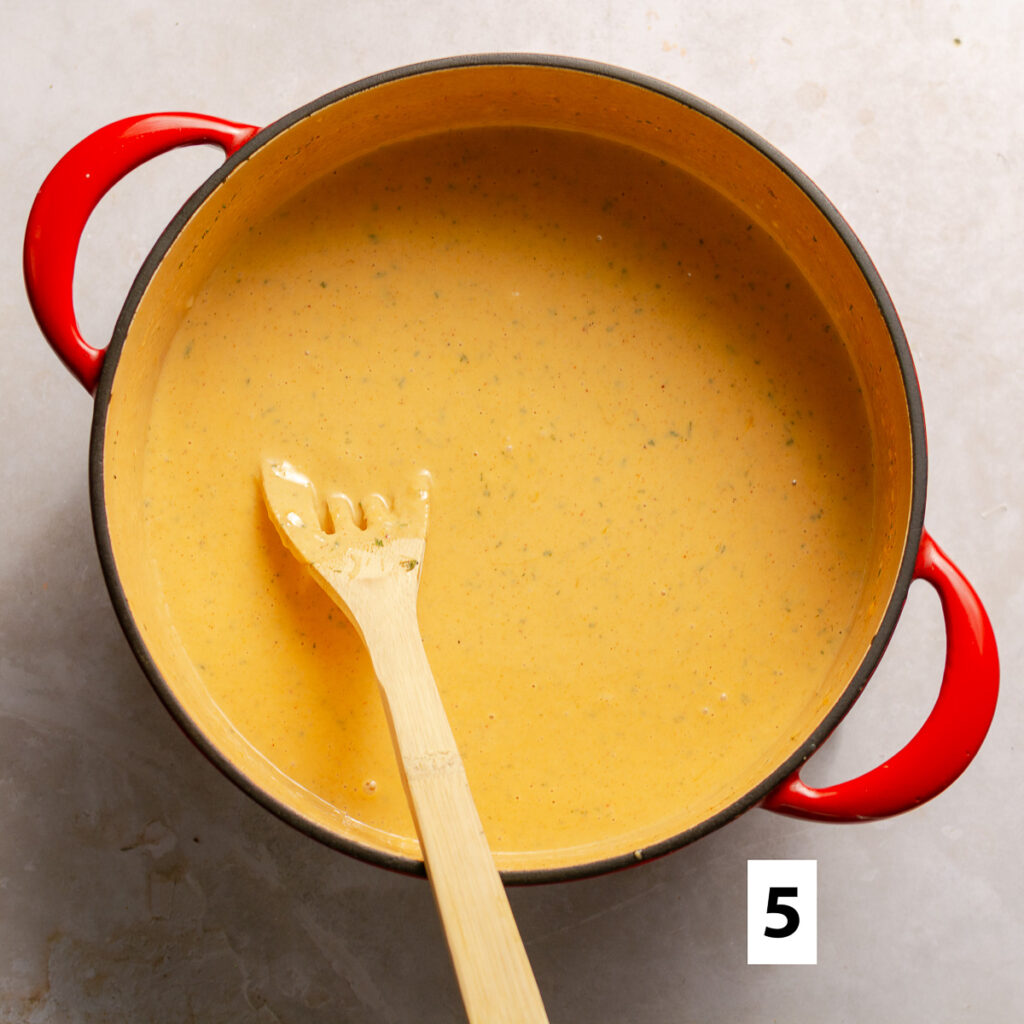cheese sauce in a dutch oven