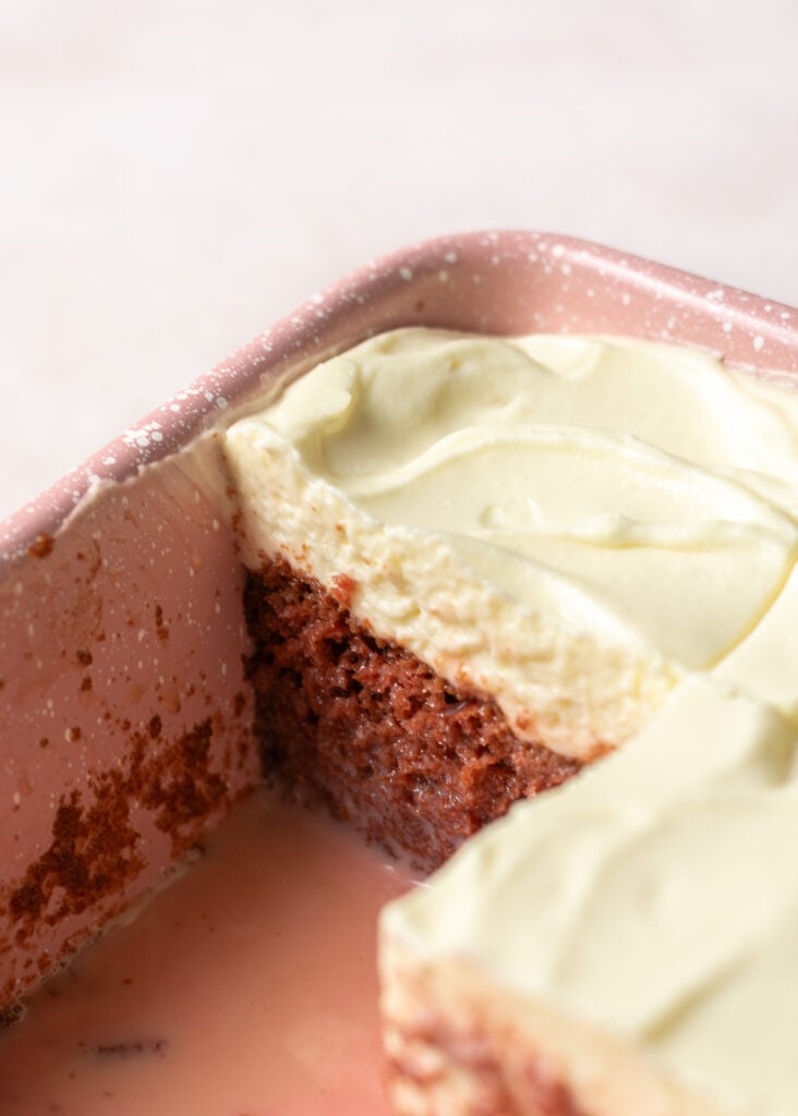 red velvet cheesecake tres leches in a baking pan