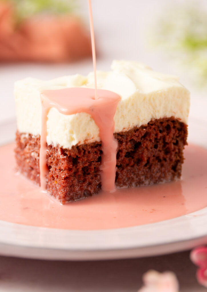 red velvet cheesecake tres leches on a plate