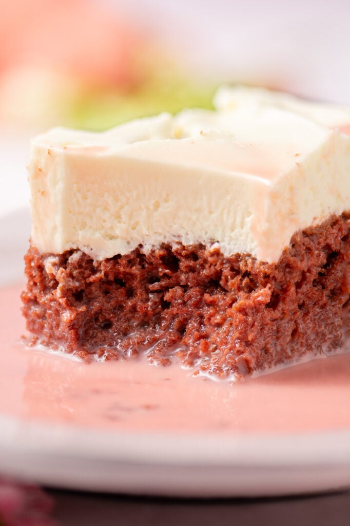 red velvet cheesecake tres leches on a plate