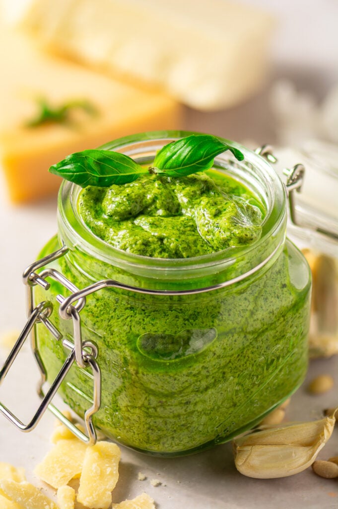 classic basil pesto in a glass jar