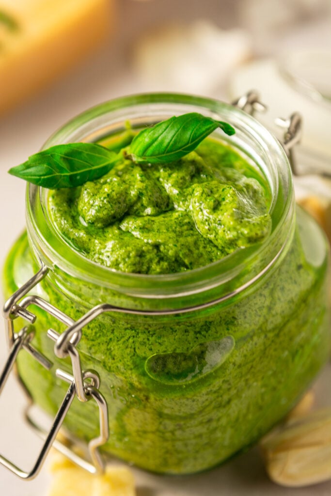 classic basil pesto in a glass jar