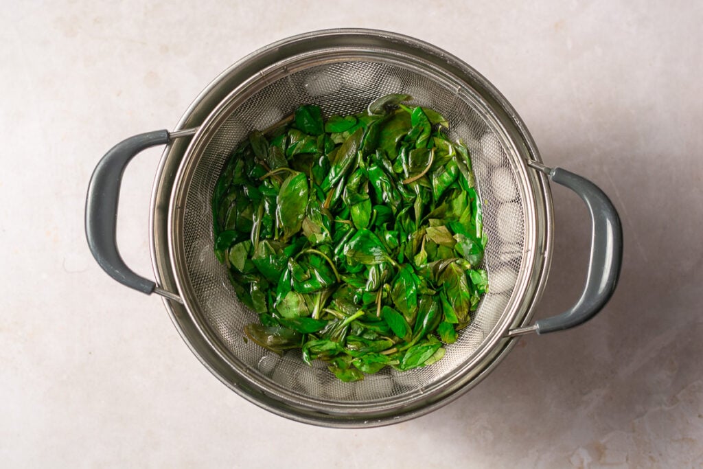 blanching sweet basil in an ice bath