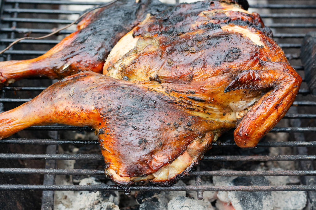 Jamaican jerk chicken on a grill