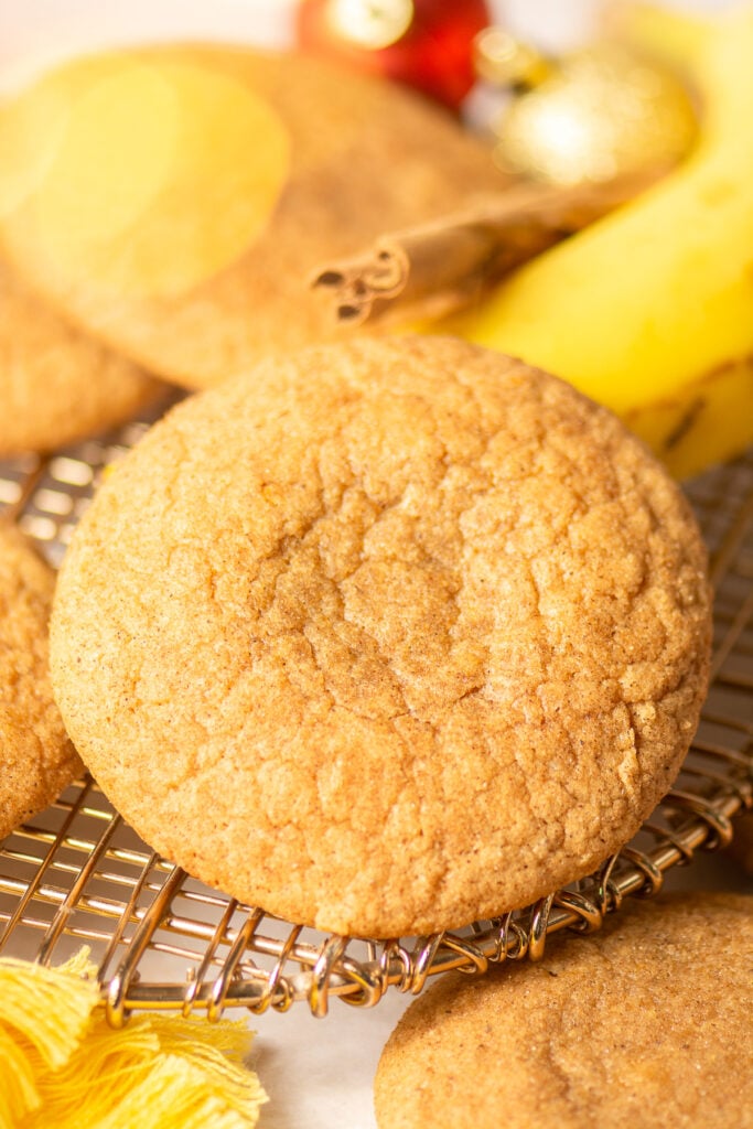 brown butter banana snickerdoodle cookies on a wire rack
