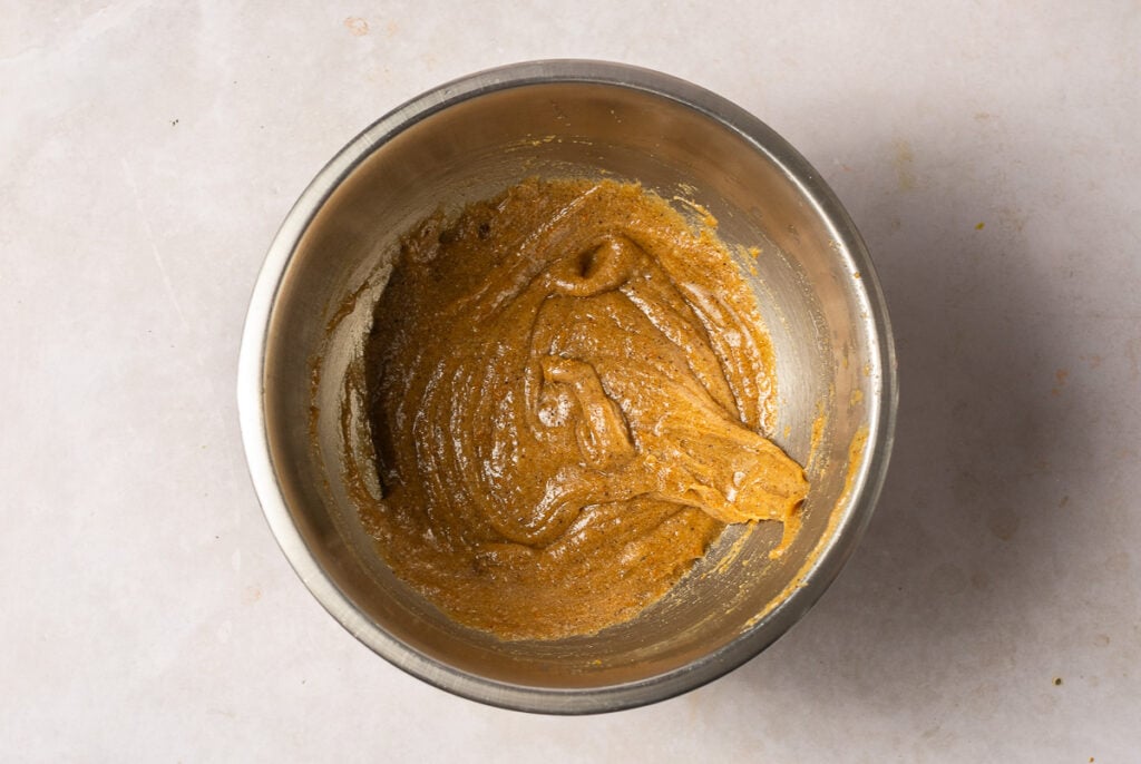 sugar, browned butter and egg mixture in a stainless steel bowl