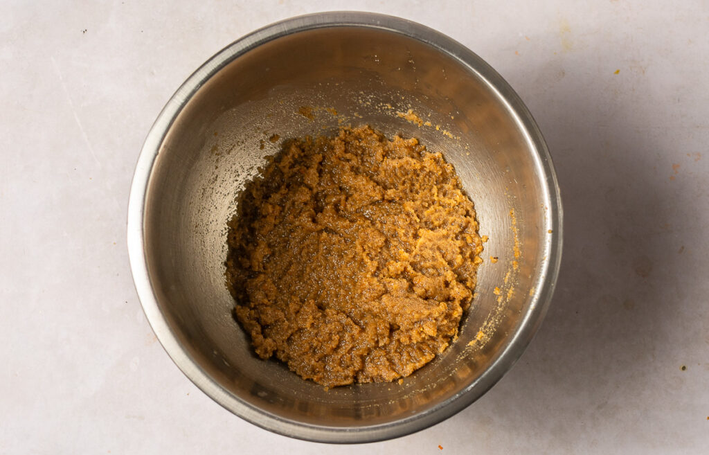 sugar and browned butter mixture in a stainless steel bowl