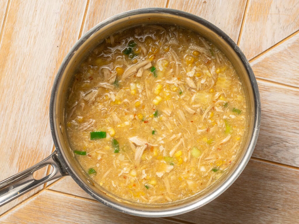 Chinese chicken and sweet corn soup in a pot