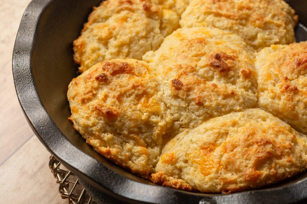 cheddar bay biscuits in a cast iron skillet