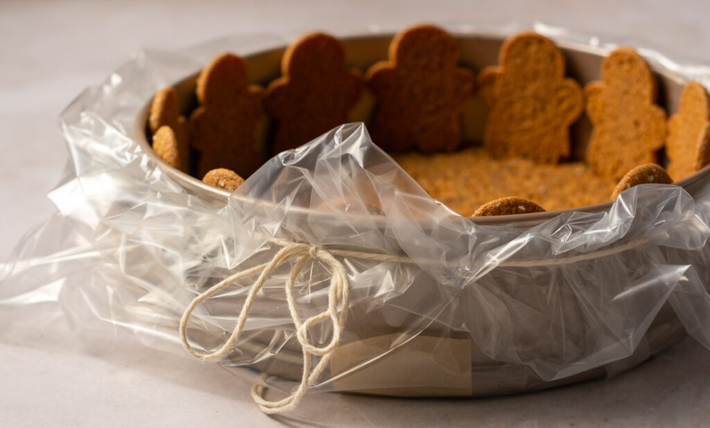 oven bag secured to springform pan with kitchen twine