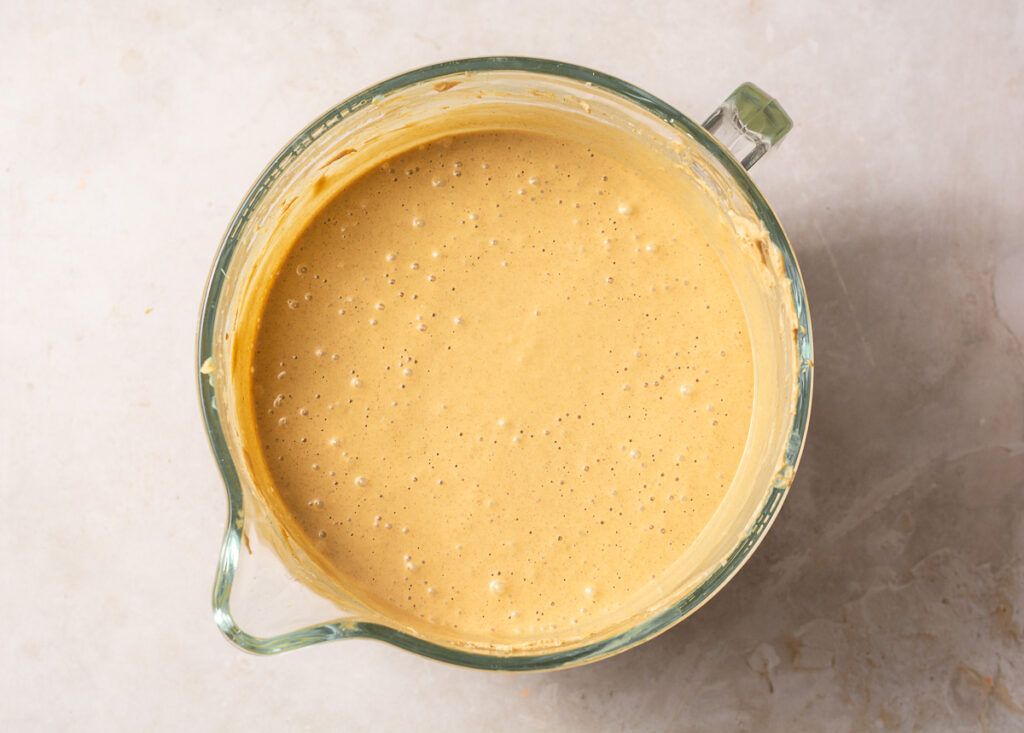 gingerbread cheesecake batter in a mixing bowl
