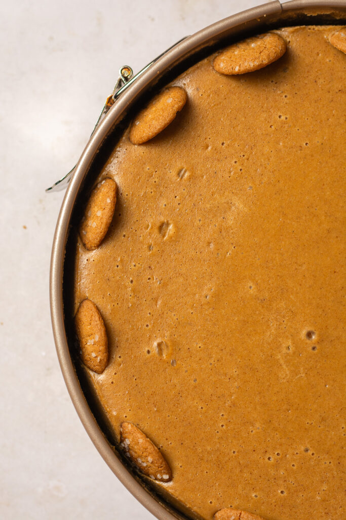 baked gingerbread cheesecake in a springform pan