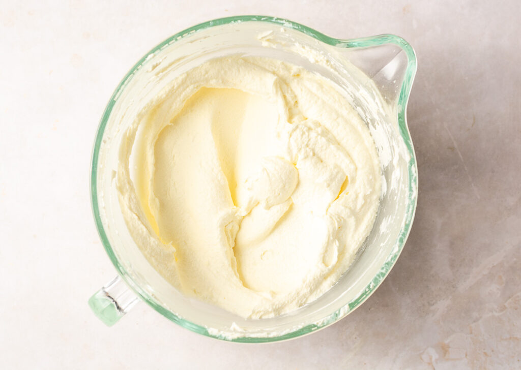 cream cheese frosting in a bowl