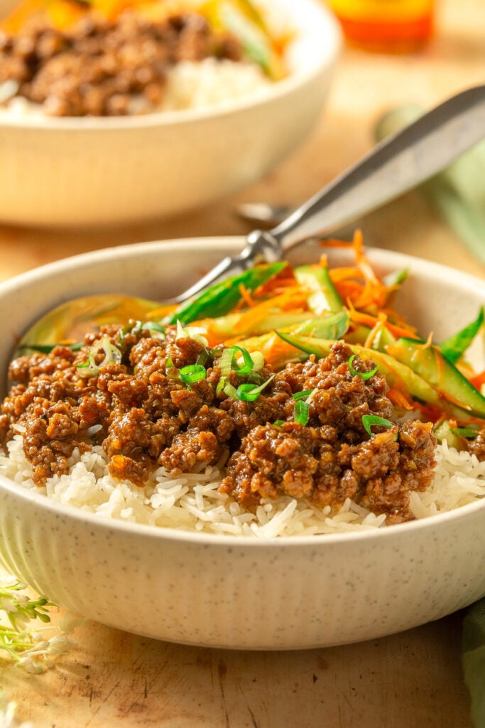 soy ginger ground beef bowl with white rice and cucumber carrot salad