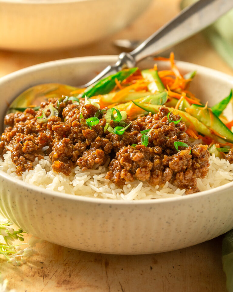 soy ginger ground beef bowl with white rice and cucumber carrot salad