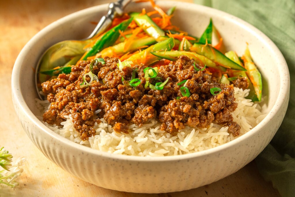 soy ginger ground beef bowl with white rice and cucumber carrot salad