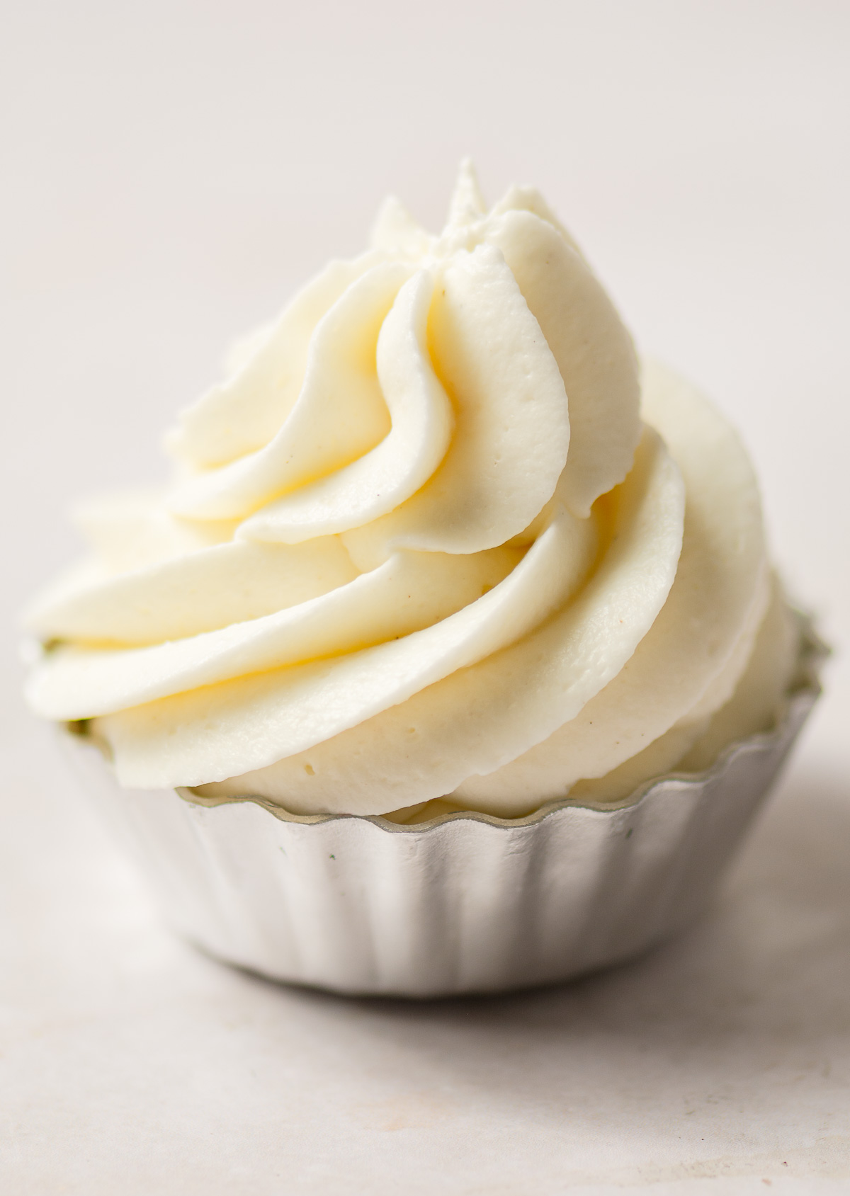 stabilized whipped cream in a mini metal pie tin