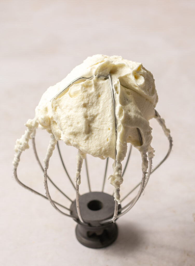 stabilized whipped cream on a whisk