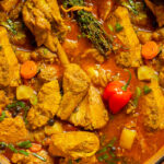 Jamaican curry chicken in a dutch oven