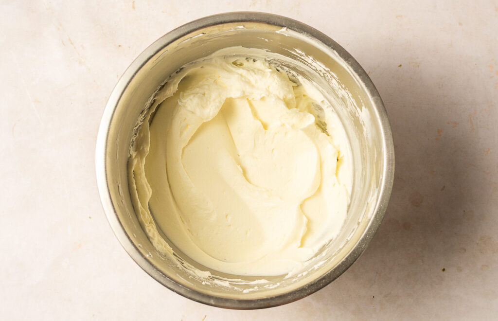 cream cheese icing in a bowl