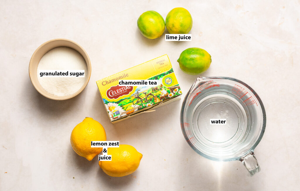 ingredients for chamomile iced tea - chamomile tea, lemons, lime juice, granulated sugar and water