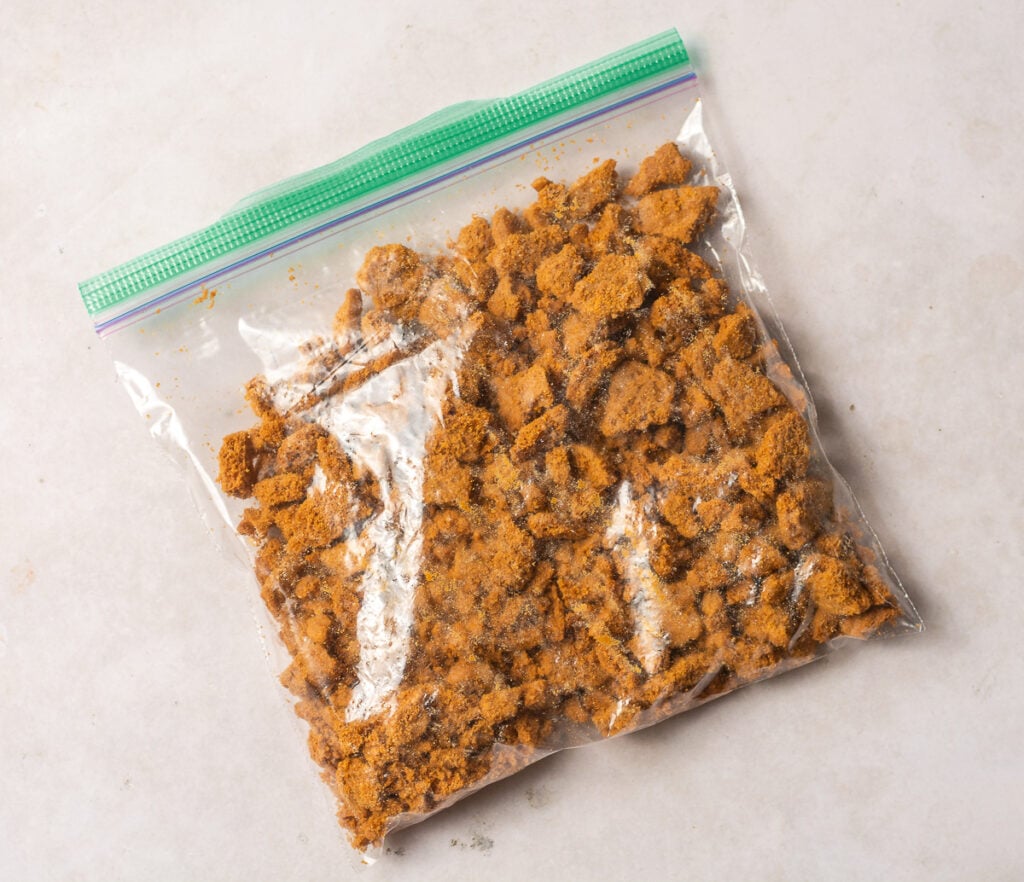 crushed biscoff cookies in a ziploc bag
