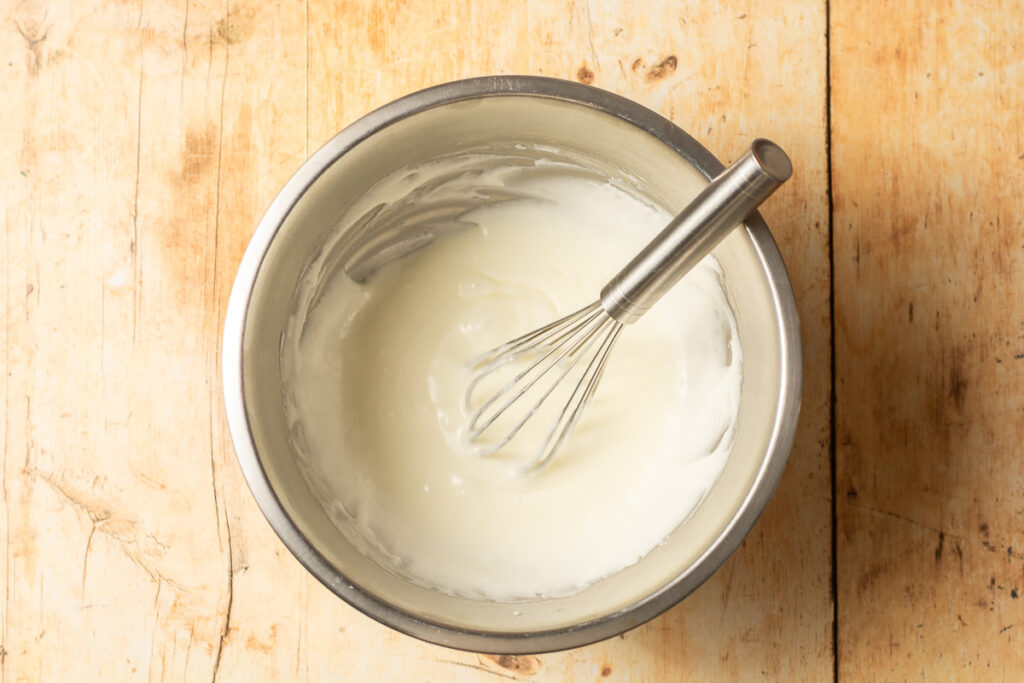 simple lemon glaze in a mixing bowl
