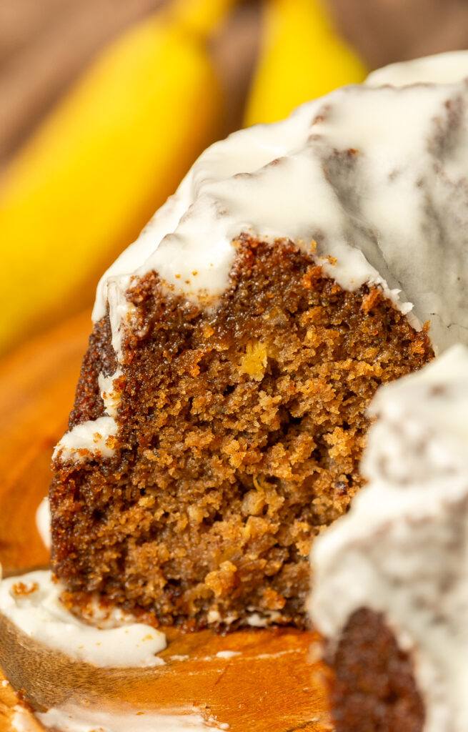 hummingbird bundt cake on a cake stand