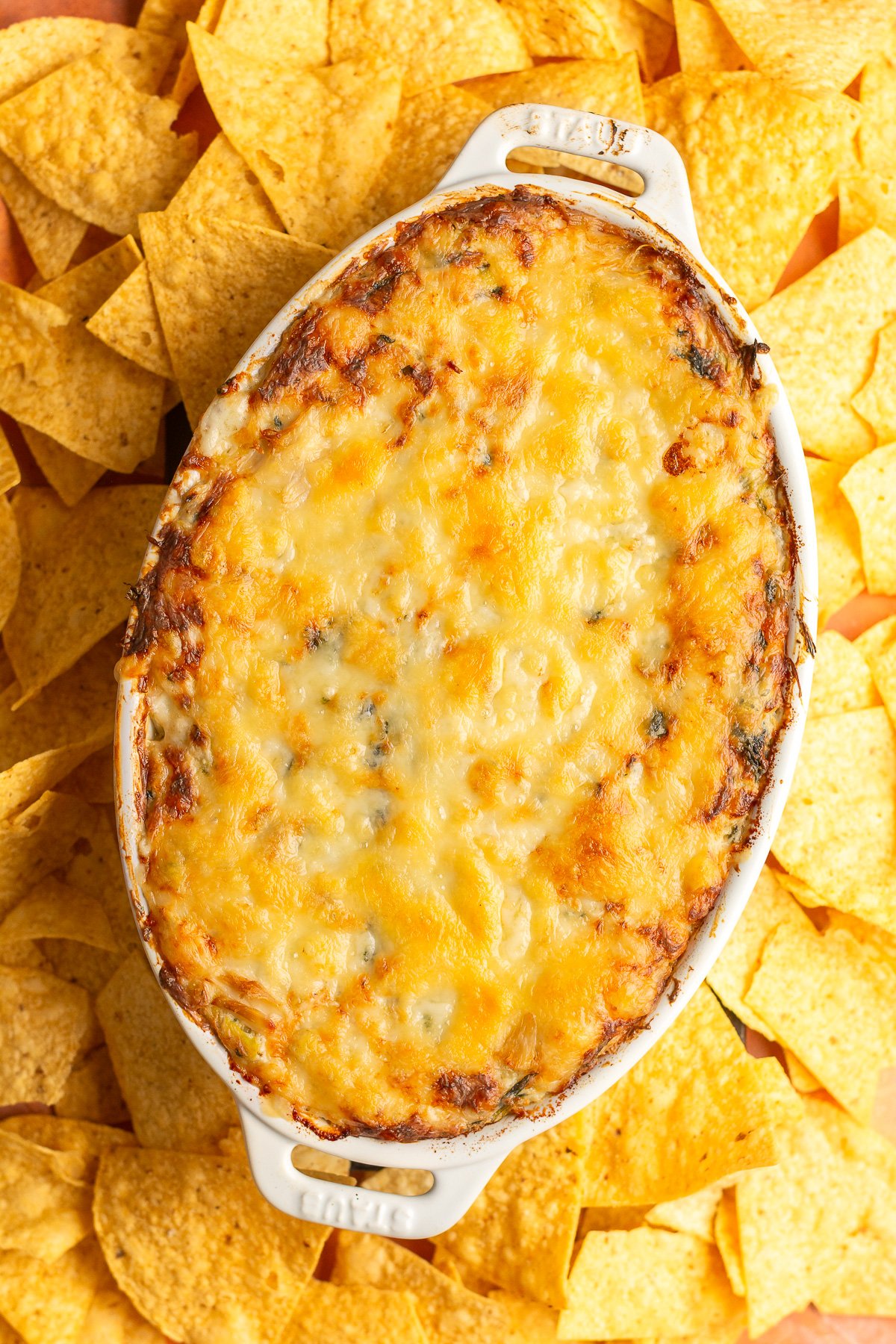hot crab spinach dip in a baking dish