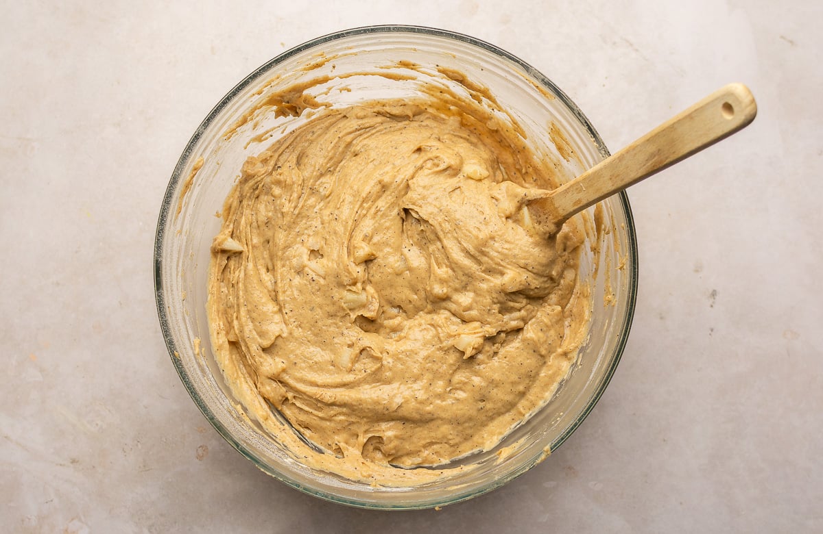 spiced pear cake batter with pears folded in