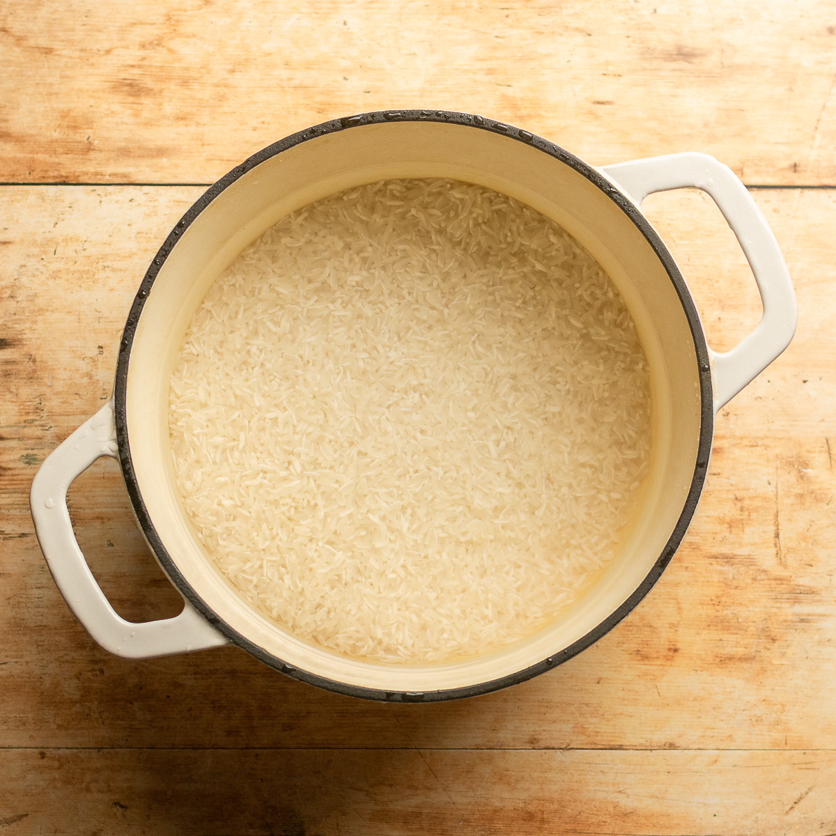 rinsed white Jasmine rice and water in a dutch oven.